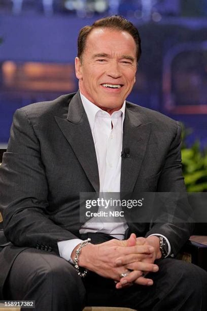 Arnold Schwarzenegger during an interview with GQ in 2019. [Left] Arnold Schwarzenegger and his family at "The Longest Yard" premiere in Los Angeles. | Photo: Getty Images & 