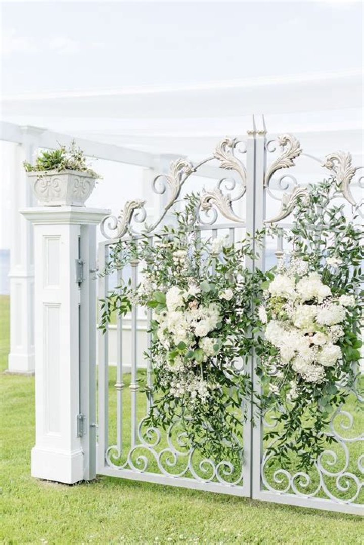 Gates wore an elegant white bridal dress while the groom wore a grey suit for the couple's pre-wedding photos on Friday. It later emerged that the photo shoot was part of a secret Muslim wedding ceremony
