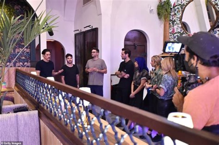 Getting ready: Sandoval and Schwartz are seen preparing for the opening party