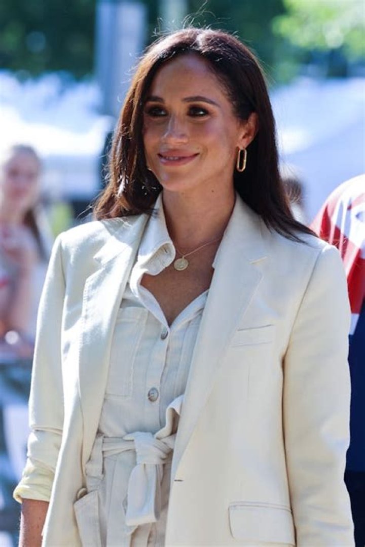 meghan markle in blazer in home office