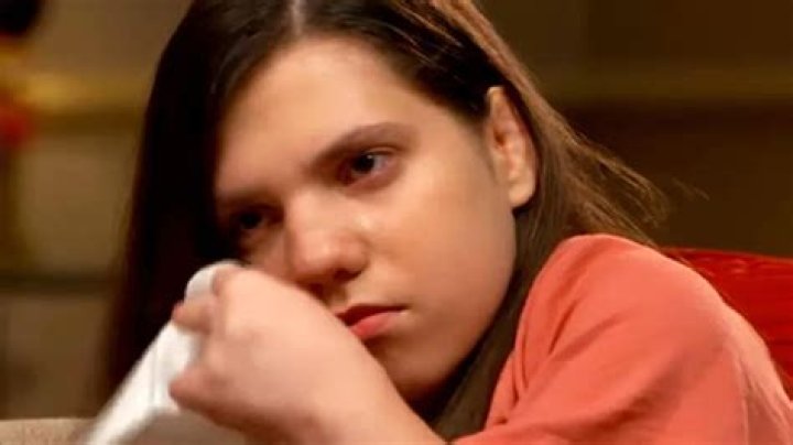 Natalia weeps as she explains she was only a child when adopted