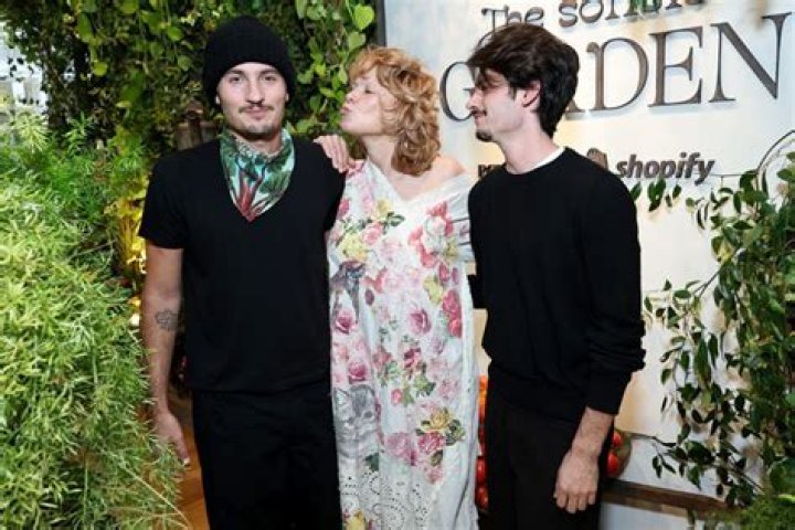Pamela Anderson with her two children, Brandon and Dylan, whom she shares with her first husband. | Source: Getty Images