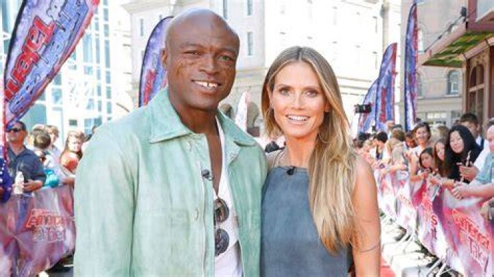 Seal and Heidi Klum smiling together on the Emmys red carpet