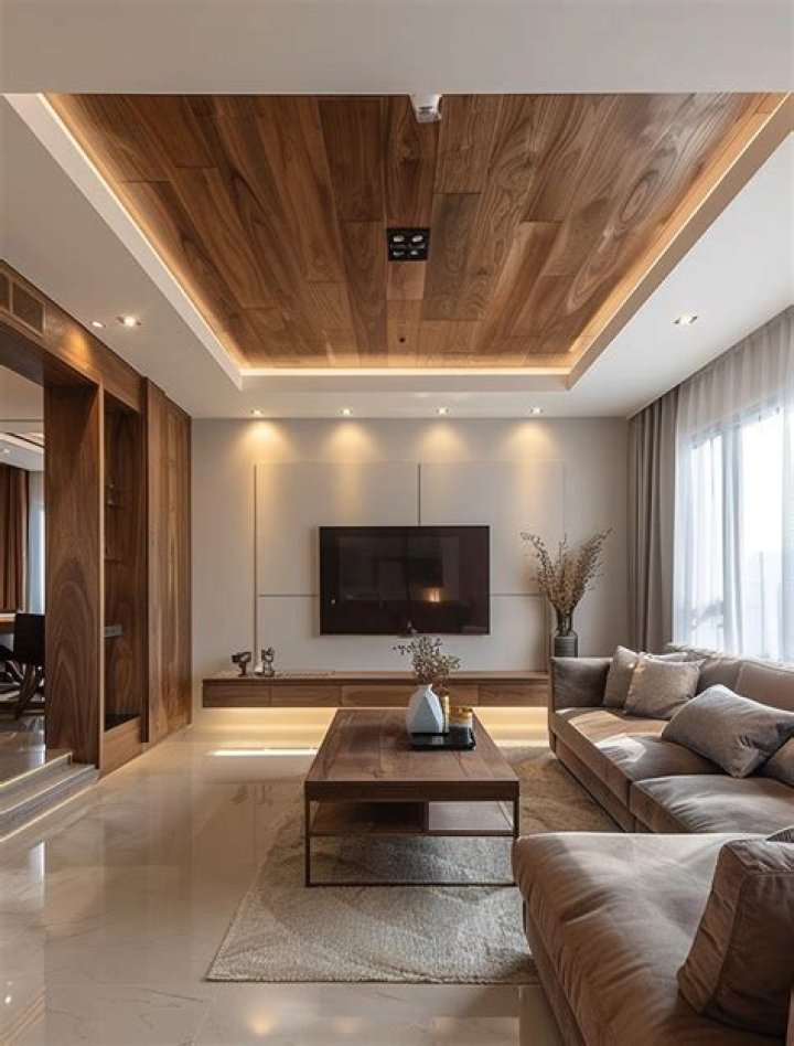 Stylish: The lounge ceiling was decorated with wooden beams and featured cozy booth-backed tables adjoining a small bar